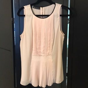 INC pink top  with black detail in the neck